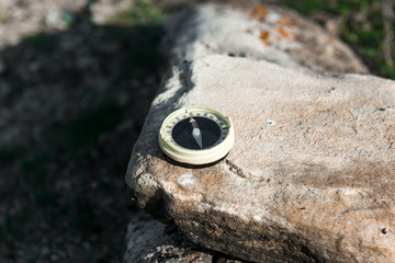 Vintage compass on the stone