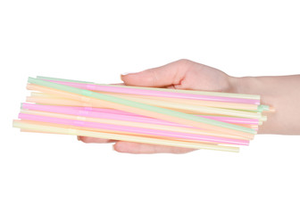 Multicolored cocktail straw in a hand