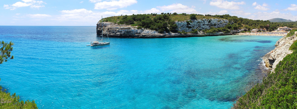 Landscape of the beautiful bay of Cala Estany d'en Mas with a wonderful turquoise sea, Cala Romantica, Porto Cristo, Majorca, Spain
