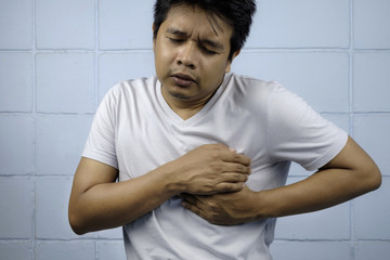 Young man suffering from heartache.