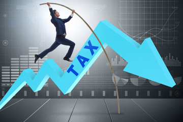 Businessman jumping over tax in tax evasion avoidance concept