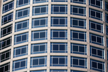 close up on windows and wall of office building