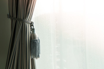 closed up beautiful curtain in daylight home concept.