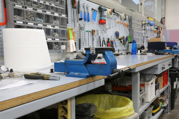 long workbench in a mechanical workshop for repairs
