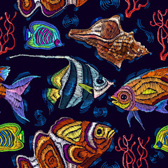 Embroidery sea life, sea shells, corals, tropical fishes seamless pattern. Classical embroidery tropical sea, wave, fishes, corals, shells seamless fashion pattern. Fashionable clothes