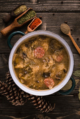 Slovak christmas cabbage soup with mushrooms on natural background.