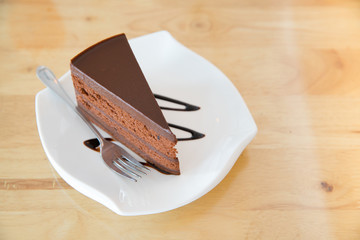 Delicious chocolate cake on plate