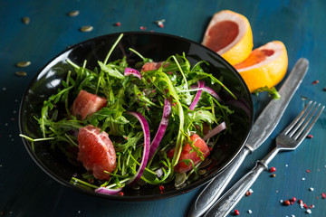 Citrus salad with arugula and grapefruit