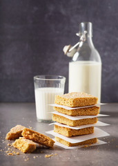 Homemade sugar crumble bars with milk. Sweet dessert. Selective focus. 