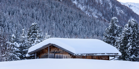 Mountain lodge in the snow