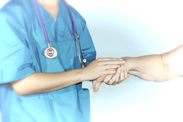 Two people holding hands with a doctor, holding the patient for support and empathy, vignette