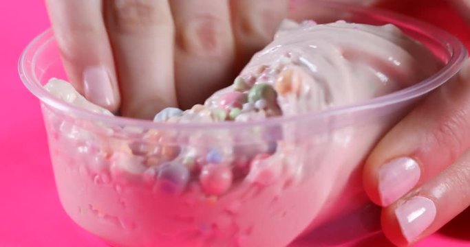 Playing with textured, colorful slime