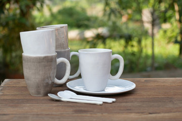 empty plates and bowls, kitchenware on wooden background