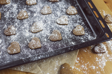 Heart shaped cookies on baking tray