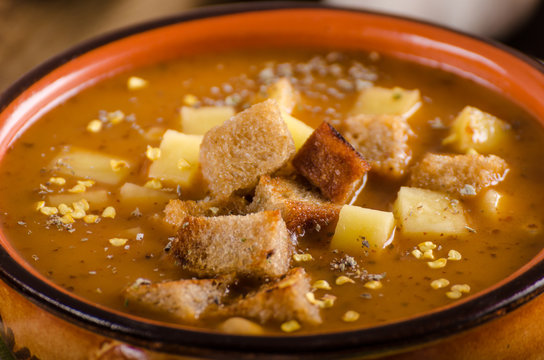 Goulash soup with croutons and potatoes