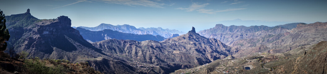 Mountainous landscape of Gran Canaria in Spain / Mountain peak of "Roque Bentaiga" next to mountain peak of "Roque Nublo"