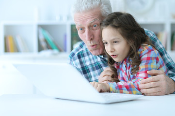 senior man using laptop 