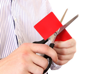 Person cutting a Credit Card