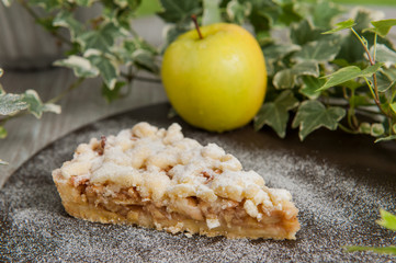 Slice or piece of homemade Apple Pie, sweet dessert