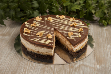 Chocolate cake with peanuts, snickers cake