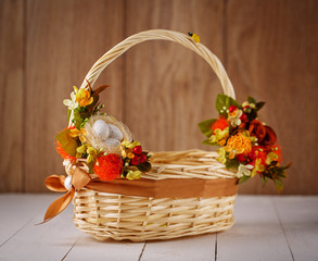 Fototapeta na wymiar Wicker Designer Basket decorated with flower
