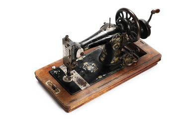 old sewing machine isolated on white