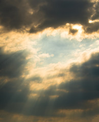Sun rays through clouds like an dramatic explosion