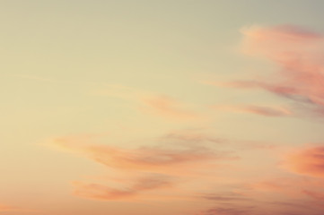 Sky background or texture at the sunset time with clouds. Copy space. Instagram