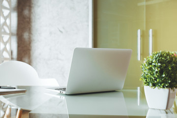 Fototapeta premium Table with laptop
