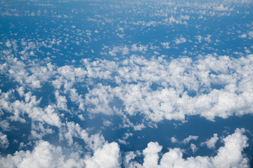 Sky background over spread cloud scatter,