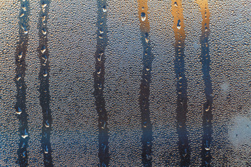 Misted glass on a background of sunrise