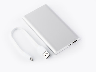Power bank for charging mobile devices. White smart phone charger with power bank. battery bank....