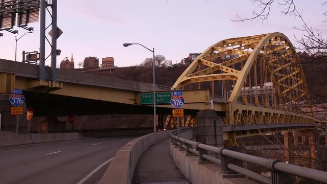 Traffic crossing the Fort Pitt Bridge in Pittsburgh Pennsylvania on early morning
