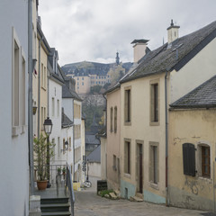 Luxembourg city details. Traditional vintage houses in dark November day. Autumn urban landscape.