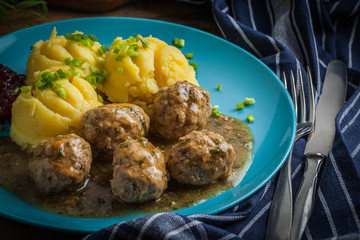 Meatballs with potatoes in dill sauce.