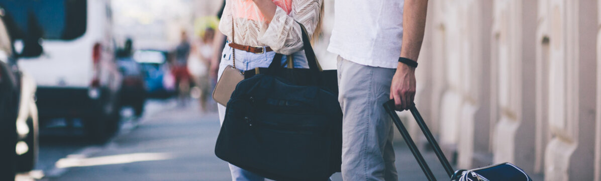 Couple Of Travelers Checking Into Hotel. Family Tourism Holidays Vacation Concept