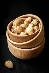 Almonds in a wooden bowl.