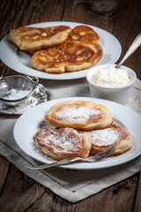 Obraz na płótnie Canvas Polish pancakes with powdered sugar.