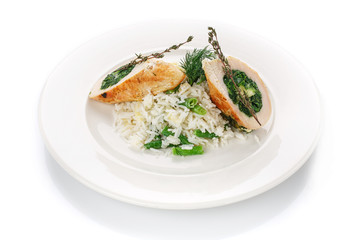 Restaurant food. Delicious lunch. Rice with meat on a plate.