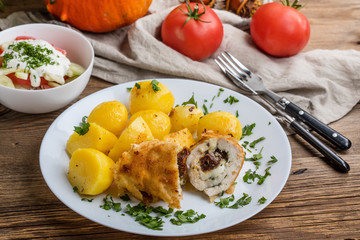 Chicken breast stuffed with cheese and dried tomatoes.