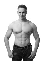 Fototapeta premium Portrait of muscular young bodybuilder on white background, toned effect