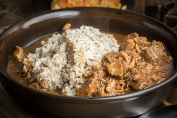 Barley groats with stewed meat.