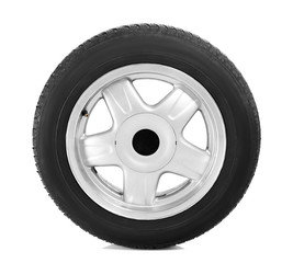 Obraz premium Car tire with wheel on white background