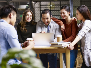 Group of young business entrepreneurs meeting in office