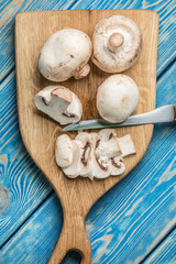 Sliced raw mushrooms.