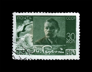 Maxim Gorky aka Alexei Maximovich Peshkov, famous Russian writer, dramatist, politician, circa 1943. canceled vintage postal stamp printed in the USSR (Soviet Union) isolated on black background.