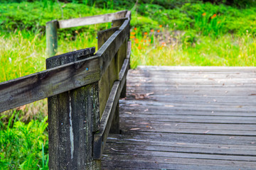 Naklejka premium Old wooden bridge and railing closeup