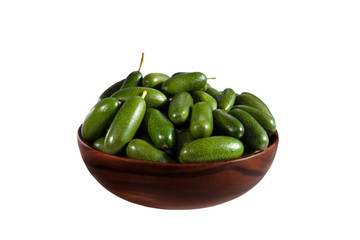 Fresh seedless cocktail avocado in the bowl isolated on white background. Cucumber avocado. Marks and Spencer new genetic gift for avocado fans.