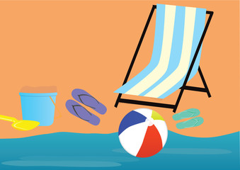 Beach chair, flip flops, inflatable ball, bucket and spoon near the sea