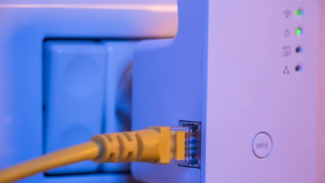 Cinemagraph of blinking signal connection status led lights in WiFi repeater